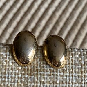 Small Trifari clip ons. Gold tone.